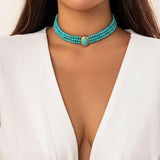 Short faux pearl and turquoise bead necklace