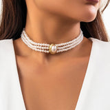 Short faux pearl and turquoise bead necklace