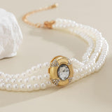 Short faux pearl and turquoise bead necklace